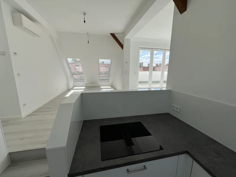 Großzügige 2-Zimmer Wohnung mit Terrasse und offener Küche in Top-Lage — photo 1